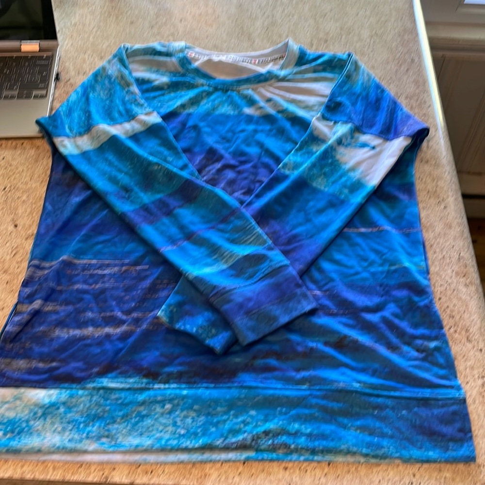 Comfy blue and white sweater. Breathable fabric.  Never worn